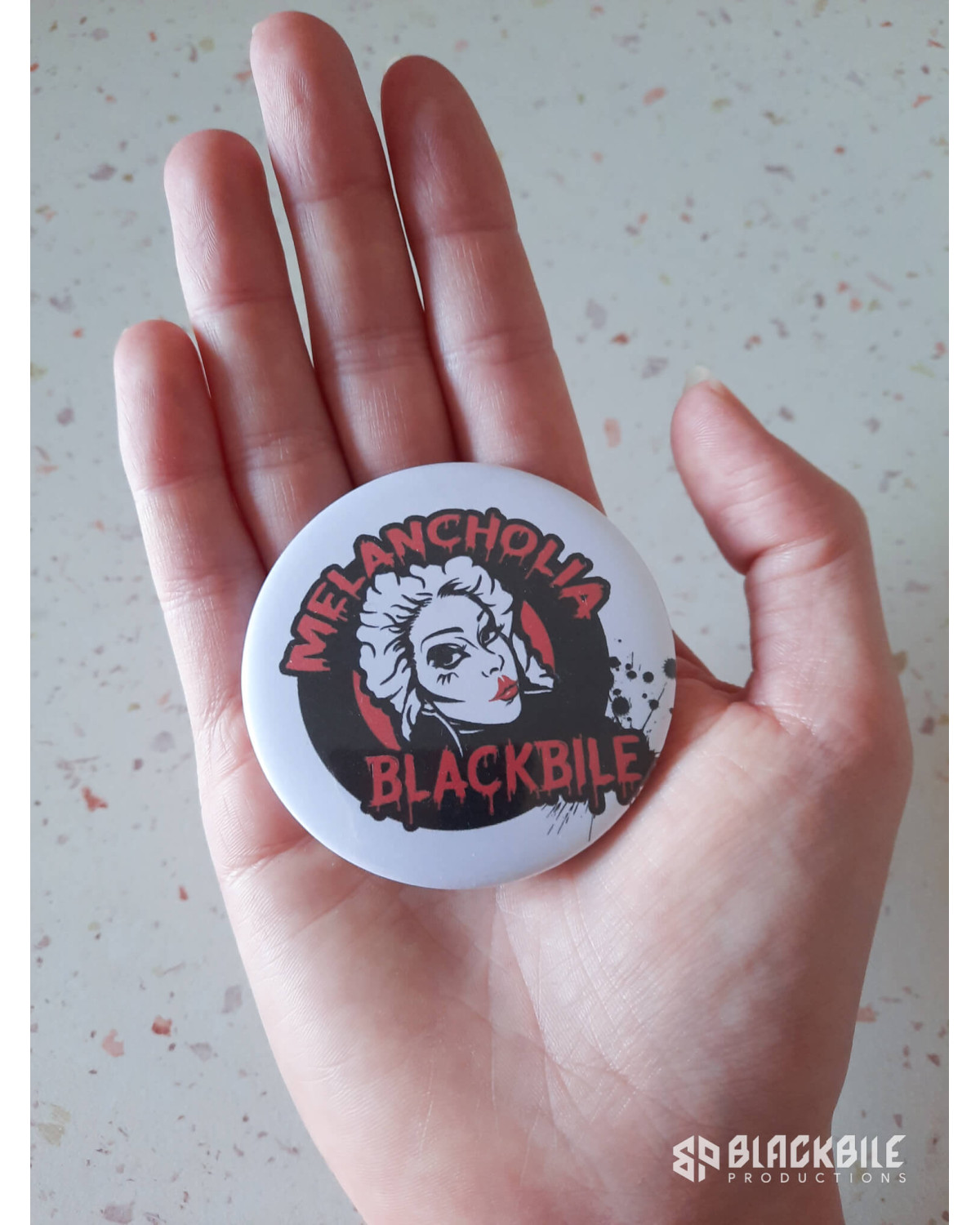 Big button badge Melancholia Blackbile white