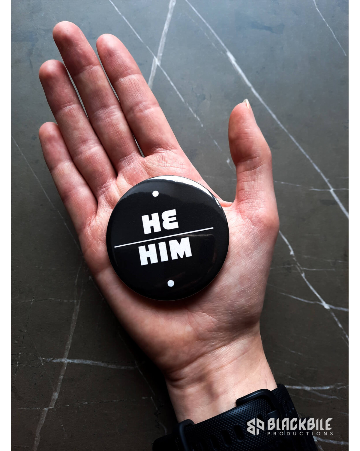 Big button badge He Him pronouns