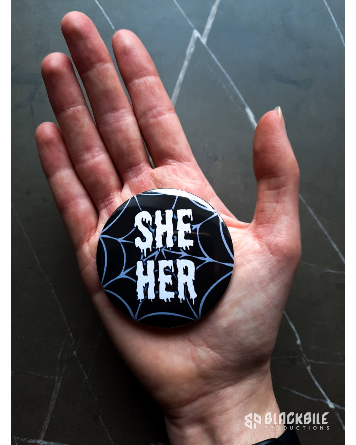 Big button badge She Her pronouns spider web